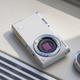 Illustration for article titled Samsung NX Mini: A Tiny New Camera System For the Selfie Generation